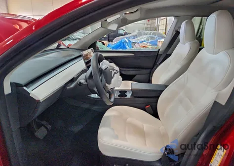 2023 Tesla Model Y from USA, damaged, VIN 7SAYGDEE2PF689855